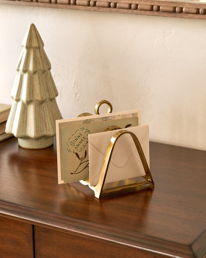 Brass Decorative Card Divider on a table with cards in it