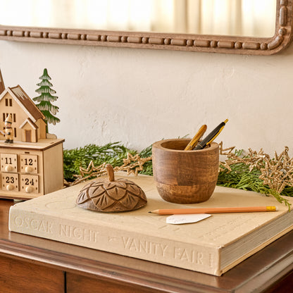 Hand-Carved Wooden Acorn Canister shown holding writing utensils