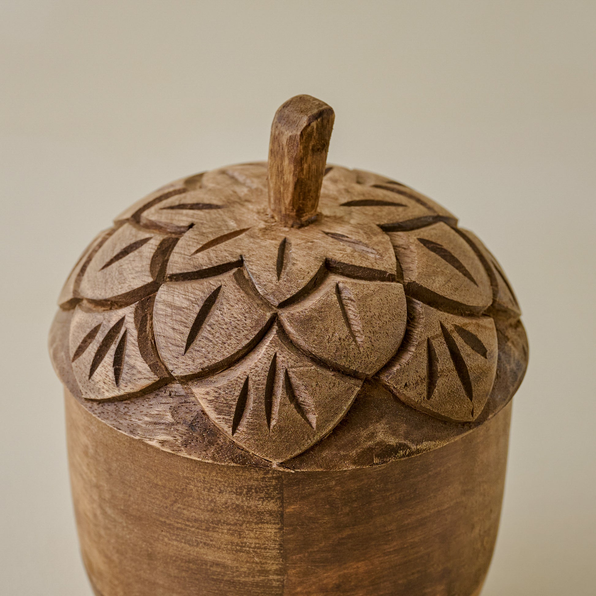 Hand-Carved Wooden Acorn Canister up close