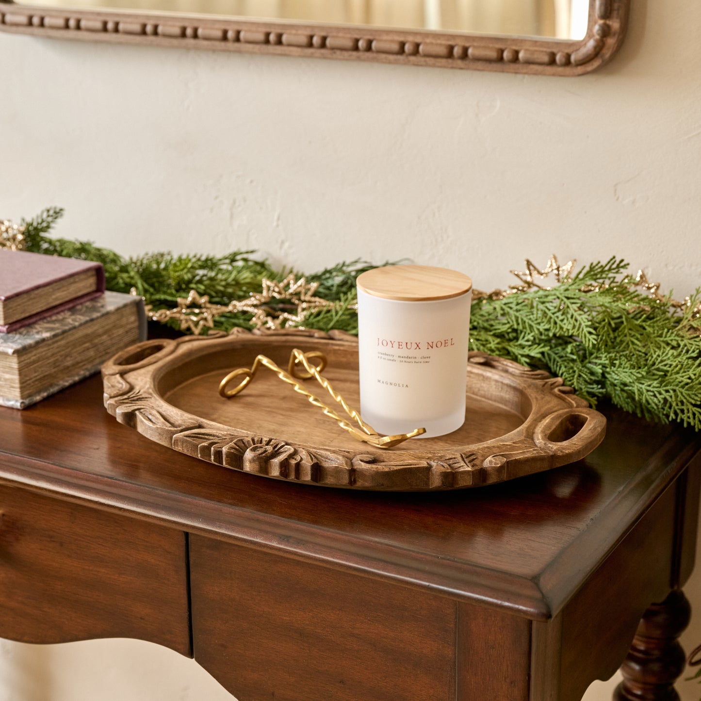 Wells Hand-Carved Wood Tray shown styled with candle and candle wick trimmer
