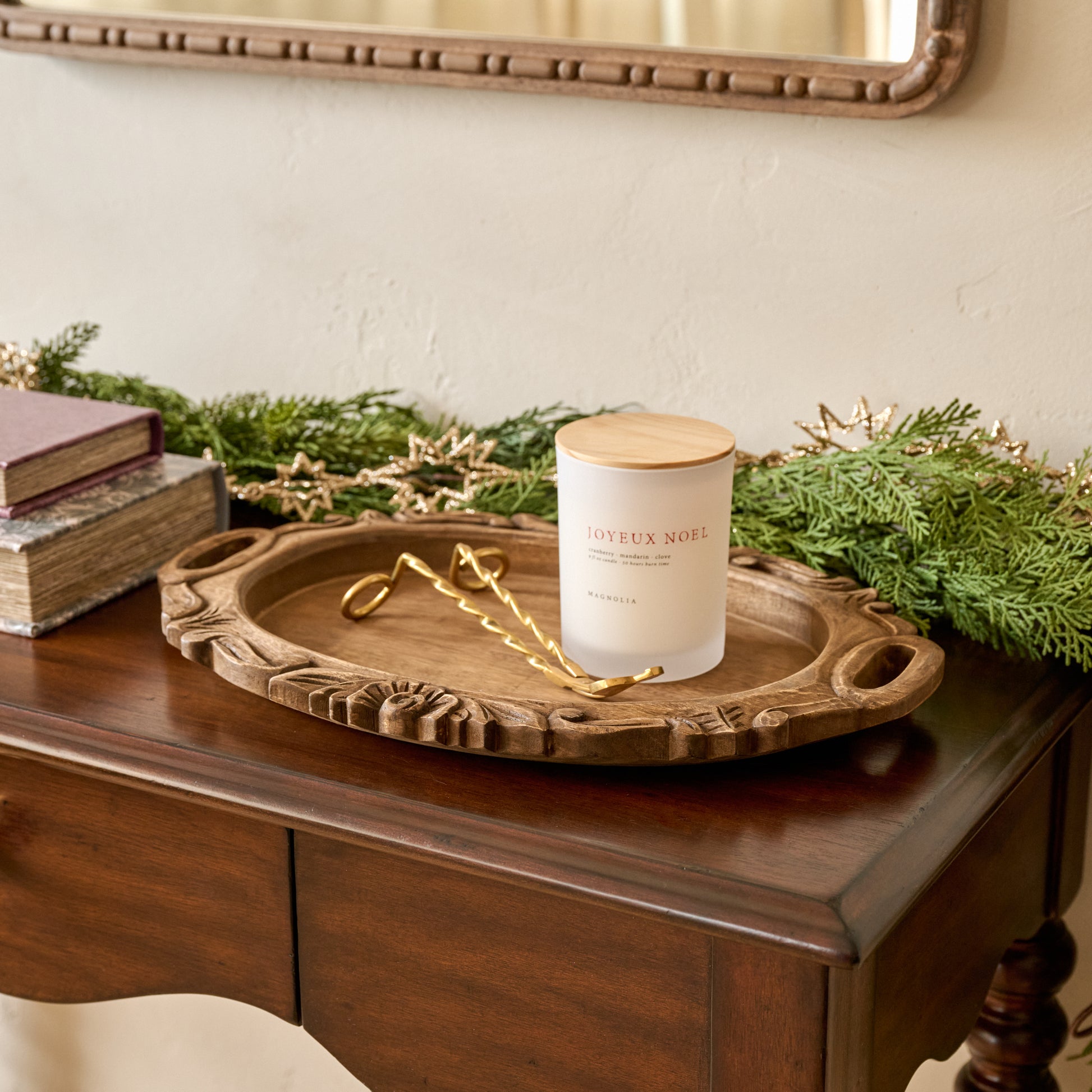Wells Hand-Carved Wood Tray shown styled with candle and candle wick trimmer