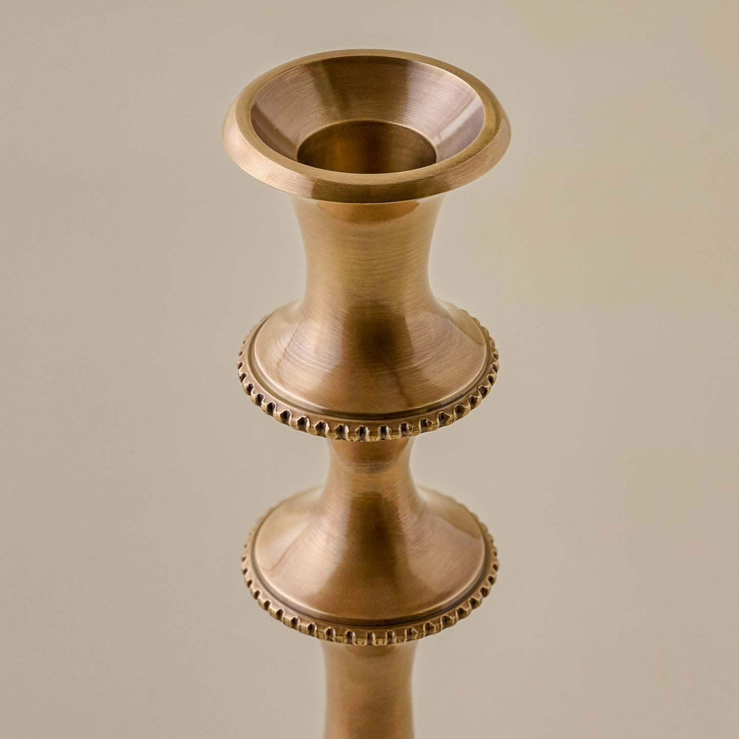 Adler Antiqued Brass Etched Taper Holder up close