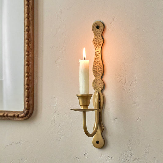 Mia Etched Brass Wall Sconce shown with candle