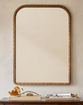 Nicolette Arched Wood Mirror shown hung above console table