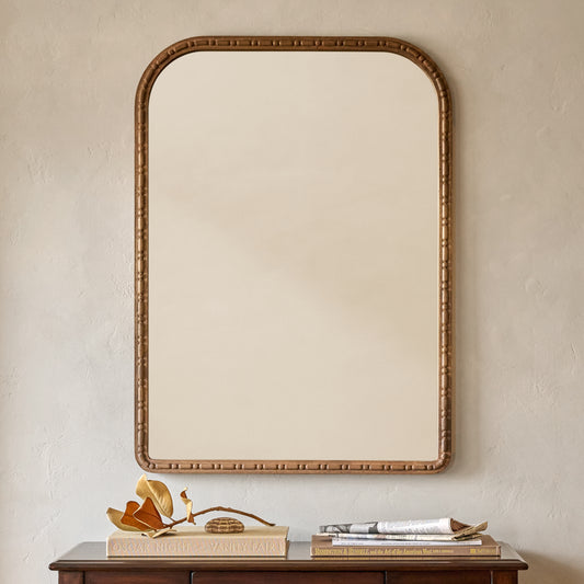 Nicolette Arched Wood Mirror shown hung above console table