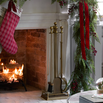 Shepherd Brass Fireplace Toolset shown by fireplace