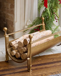 Shepherd Brass Log Holder shown holding logs