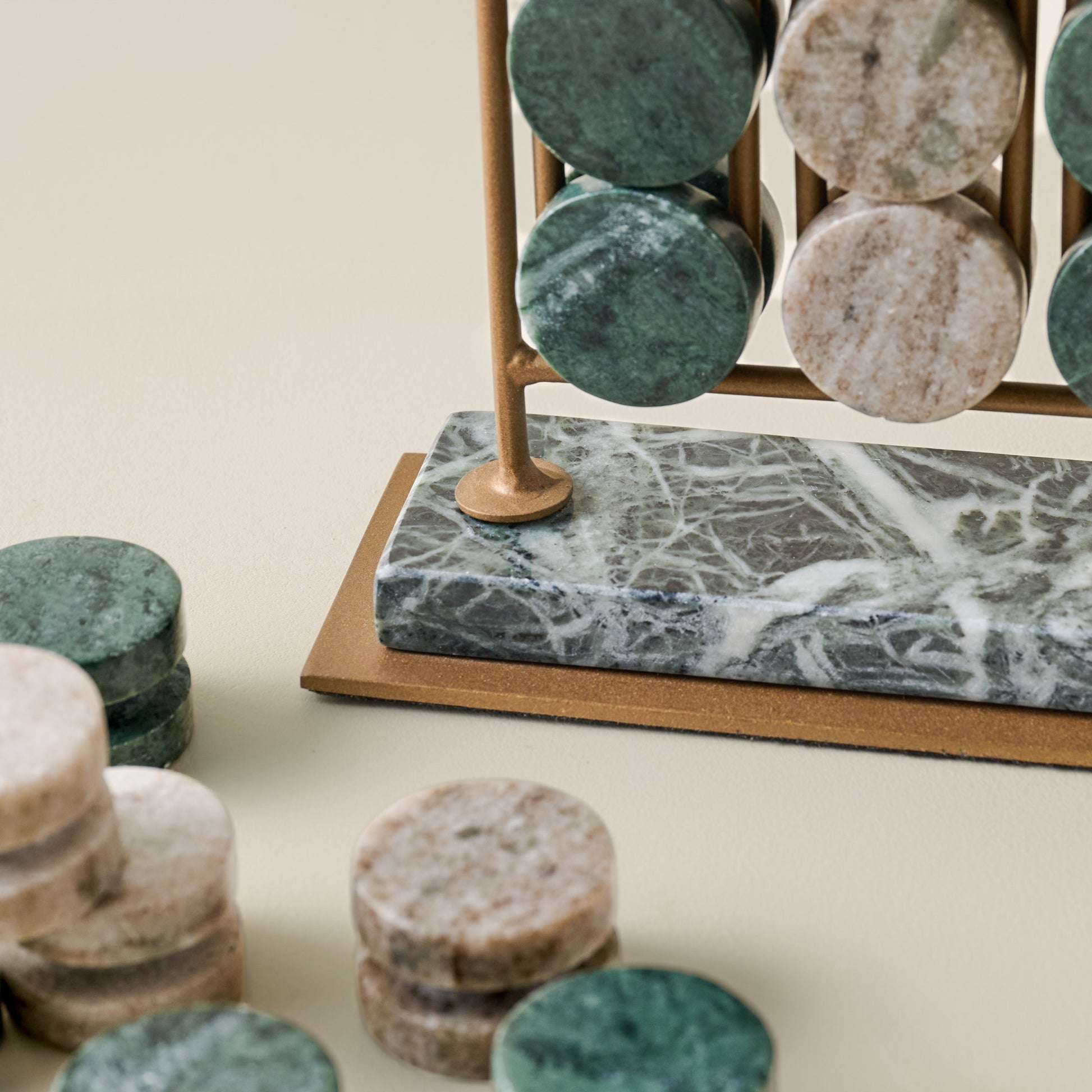 Green Marble Four In-a-Row Decorative Game up close