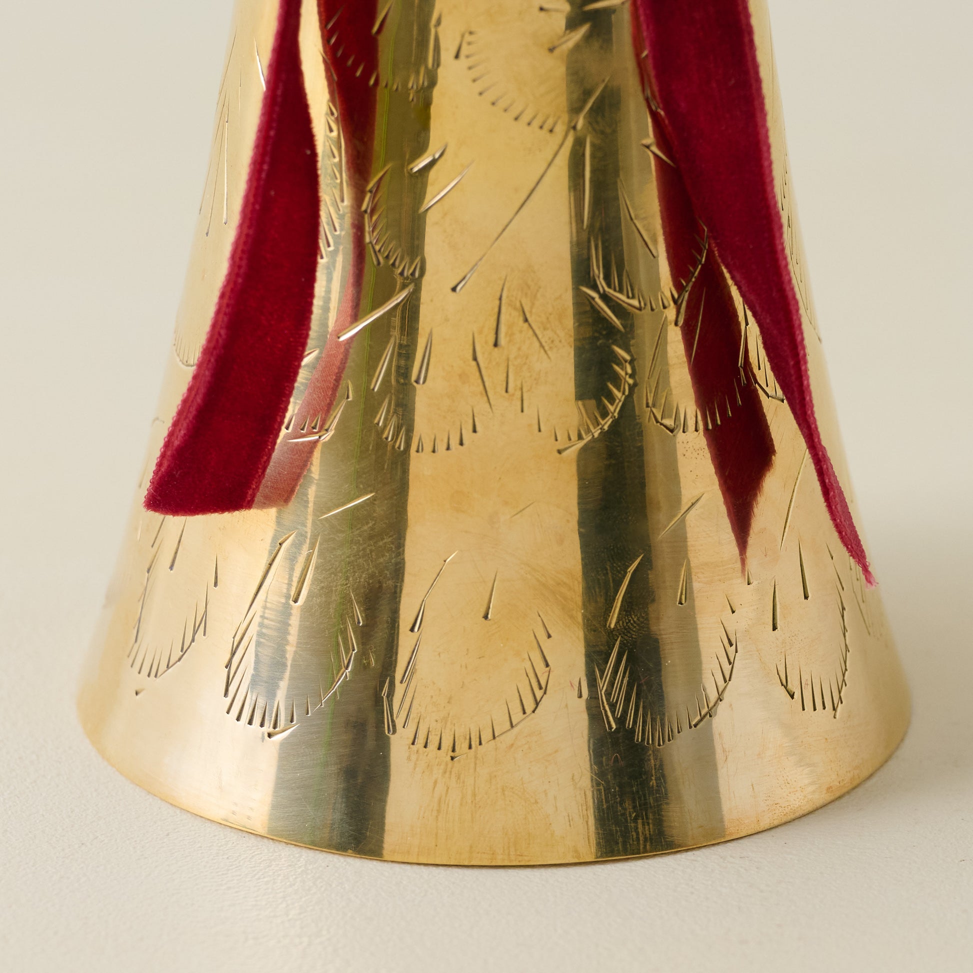 Medium Ava Etched Brass Bell up cose
