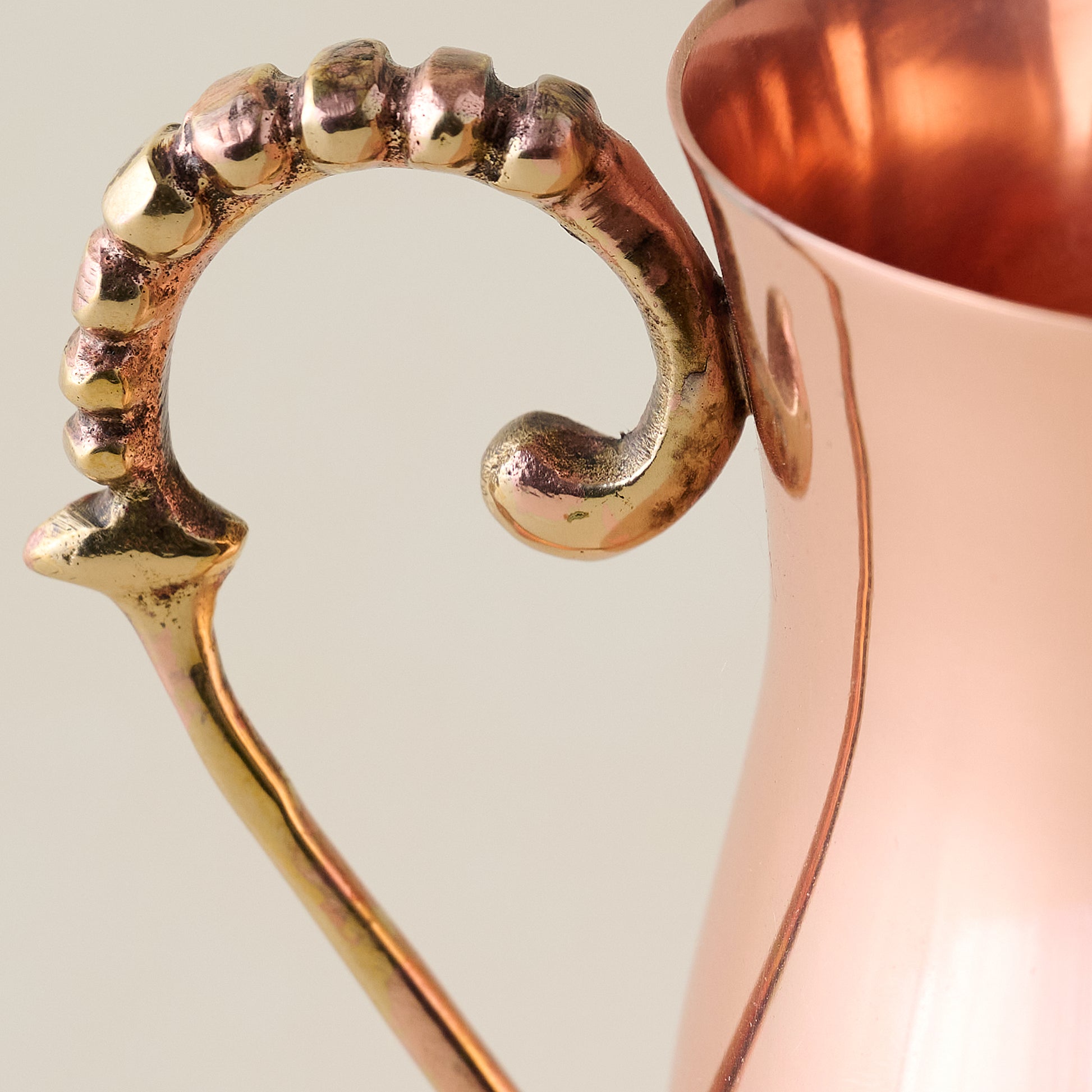 Antique Copper Creamer handle up close