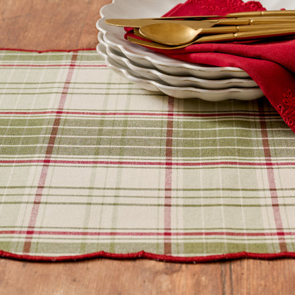 Magnolia Festive Plaid Reversible Table Runner shown on table with green plaid side facing up - up close