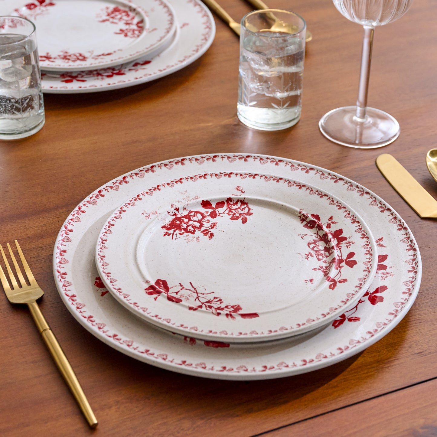 Heirloom Garden Scarlett Floral Salad Plate shown set on table