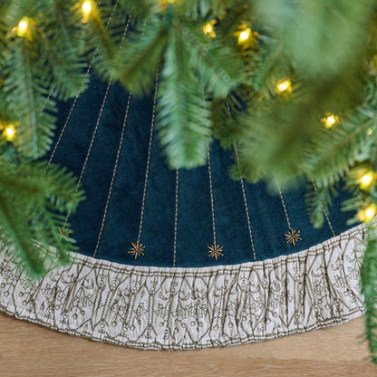 Hand-Beaded Evermore Velvet Tree Skirt shown from above under tree