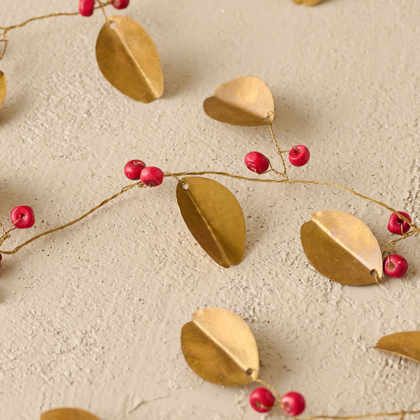 Brass Leaf + Red Berry Garland up close