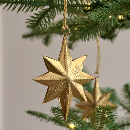 Celestial Star Ornaments, Set of 12 shown hung on tree
