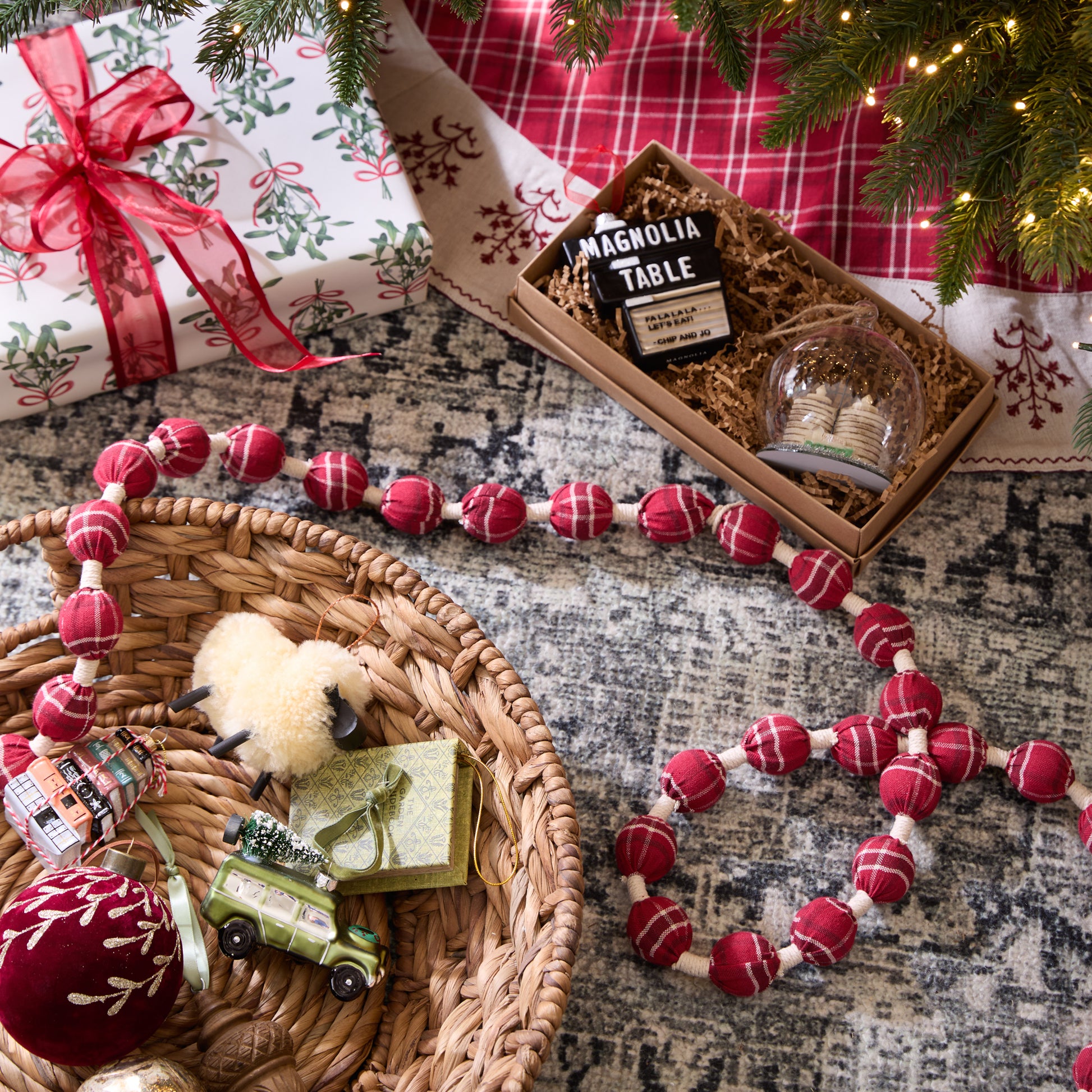 Home Again Plaid Garland shown with other tree decor