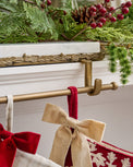 Marble and Gilded Multi Stocking Holder shown holding stockings