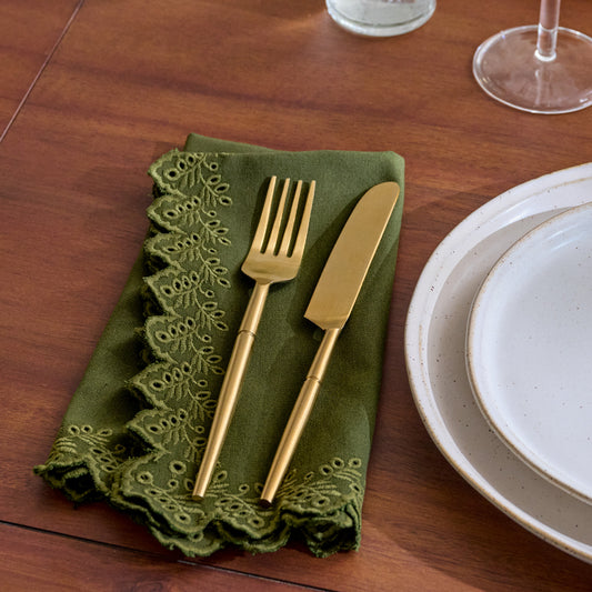 Winter Moss Embroidered Scalloped Edge Napkin folded shown on table