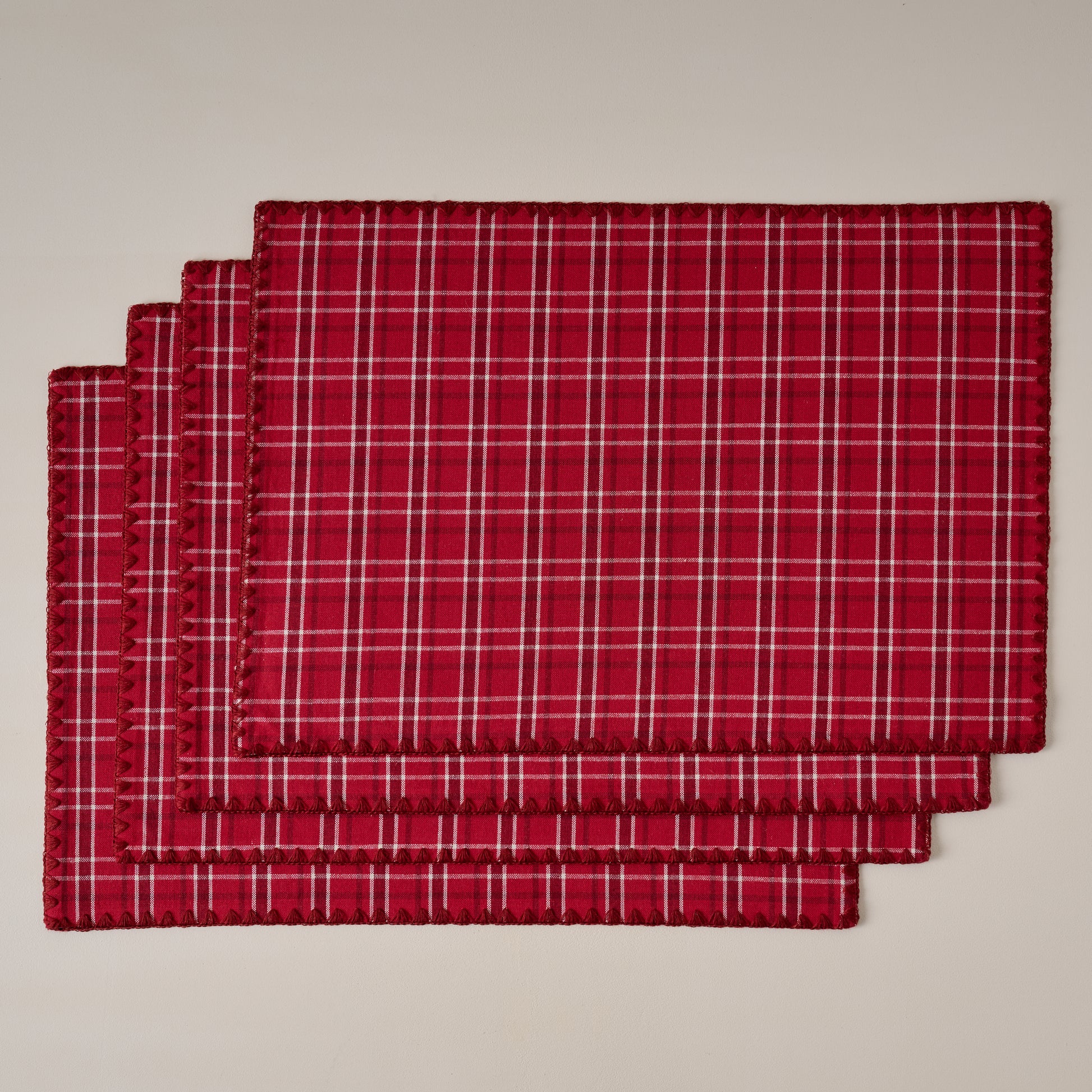 Magnolia Festive Plaid Reversible Placemat Set of Four - red side showing