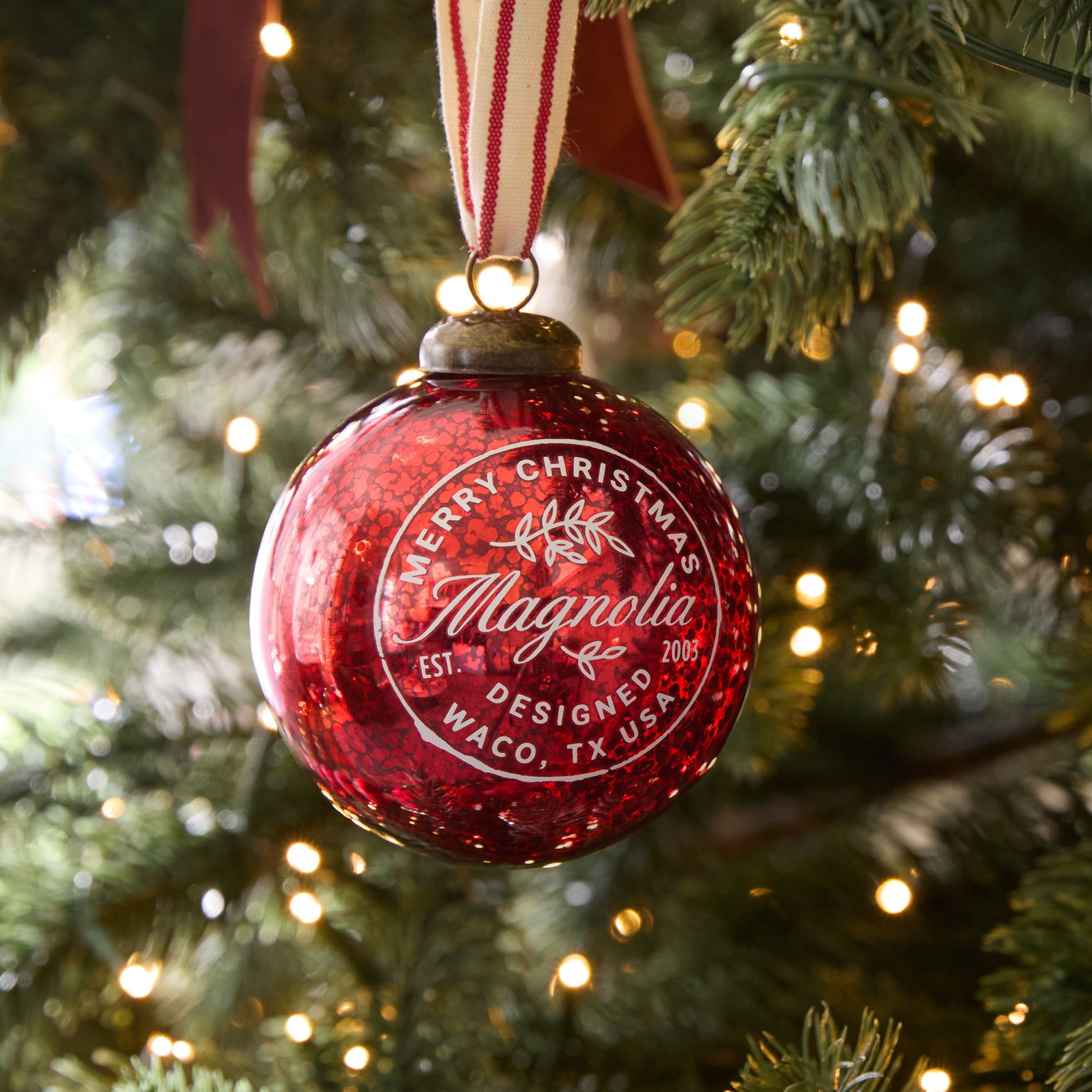 Magnolia Mercury Glass Ornament on a tree