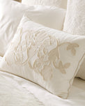 Floral Applique Lumbar Pillow on bed