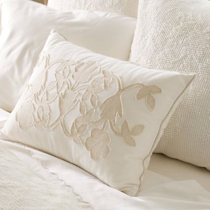 Floral Applique Lumbar Pillow on bed