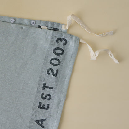 Magnolia Est. Jacquard Tea Towel - Blue close up 