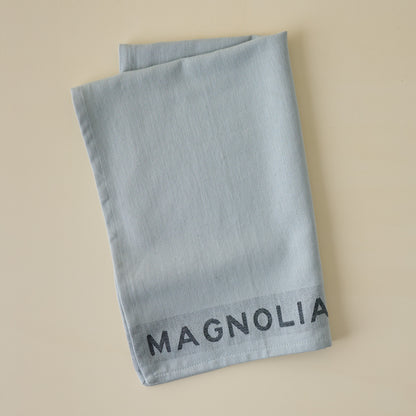 Magnolia Est. Jacquard Tea Towel - Blue folded