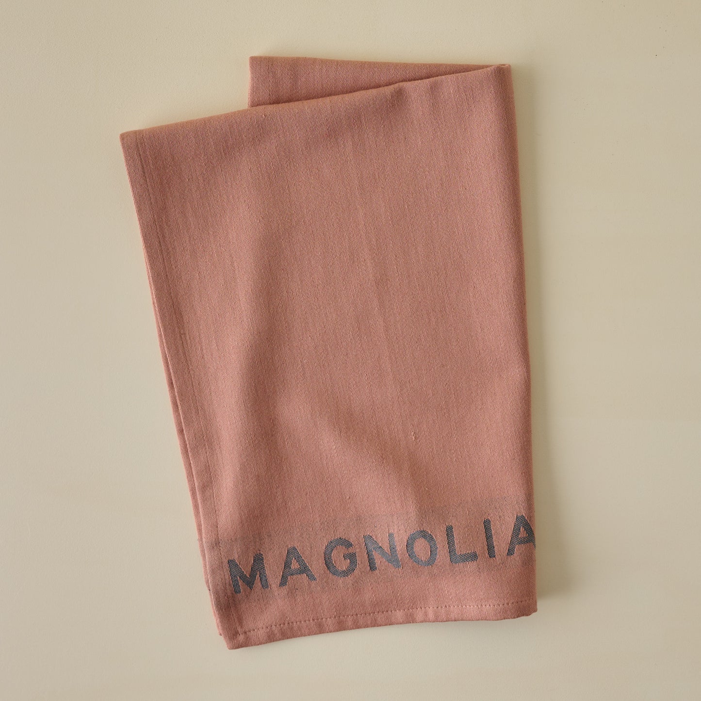 Magnolia Est. Jacquard Tea Towel - Pink folded