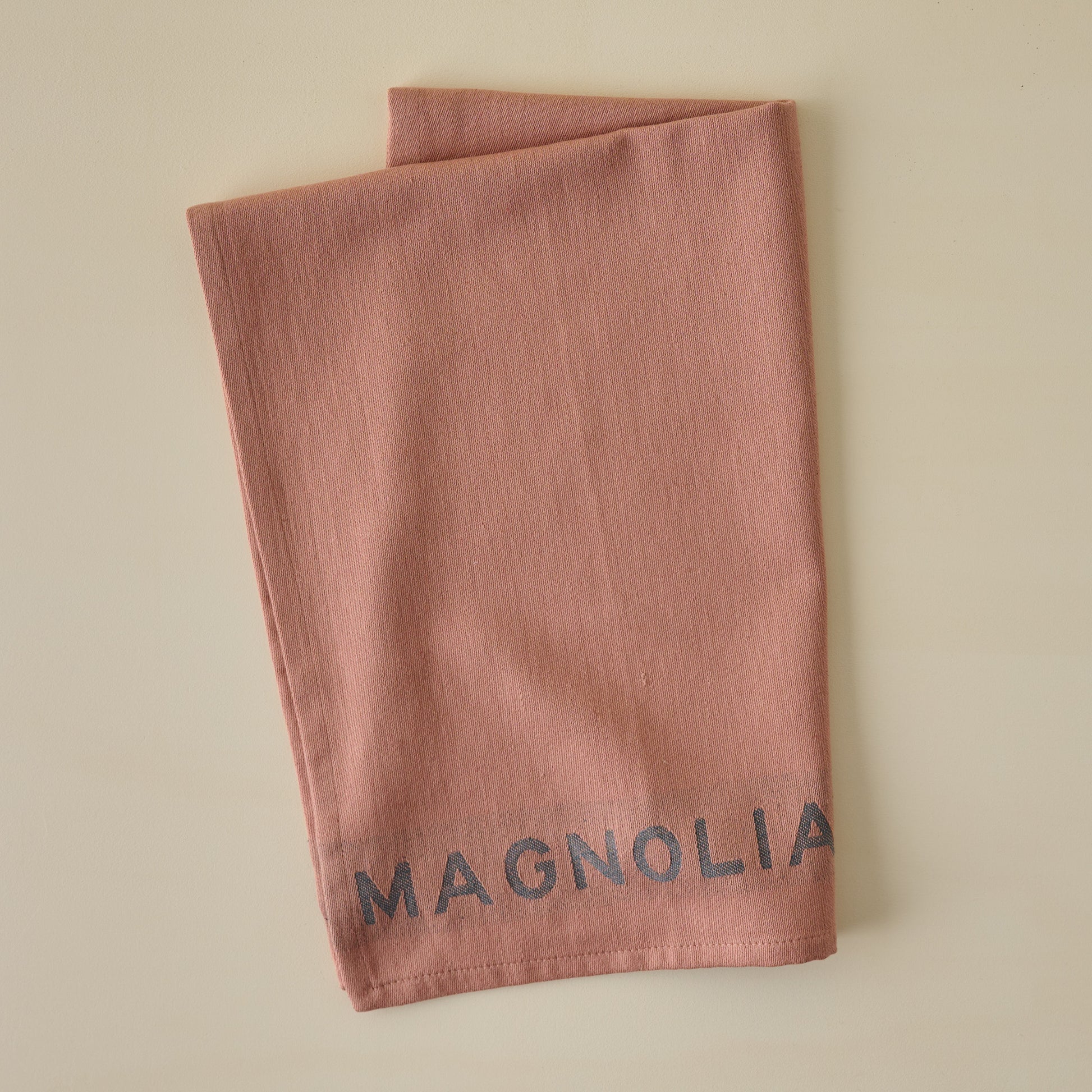 Magnolia Est. Jacquard Tea Towel - Pink folded