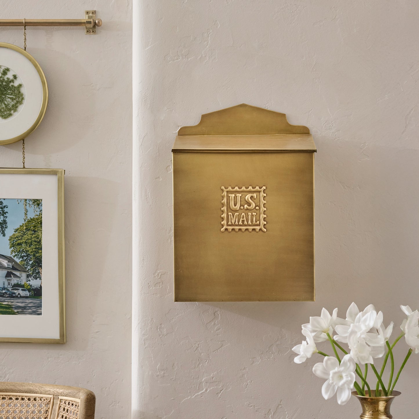 Antique Inspired Brass Mail Box in a room 