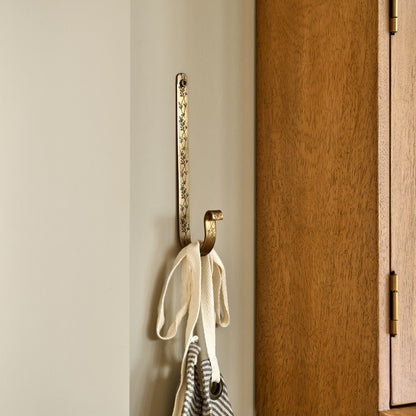 Celine Etched Brass Hook in a room 