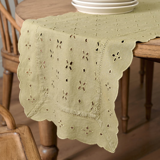 Earth Green Eyelet Table Runner close up on table