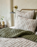 Floral Jacquard Kantha Quilt Cover on bed