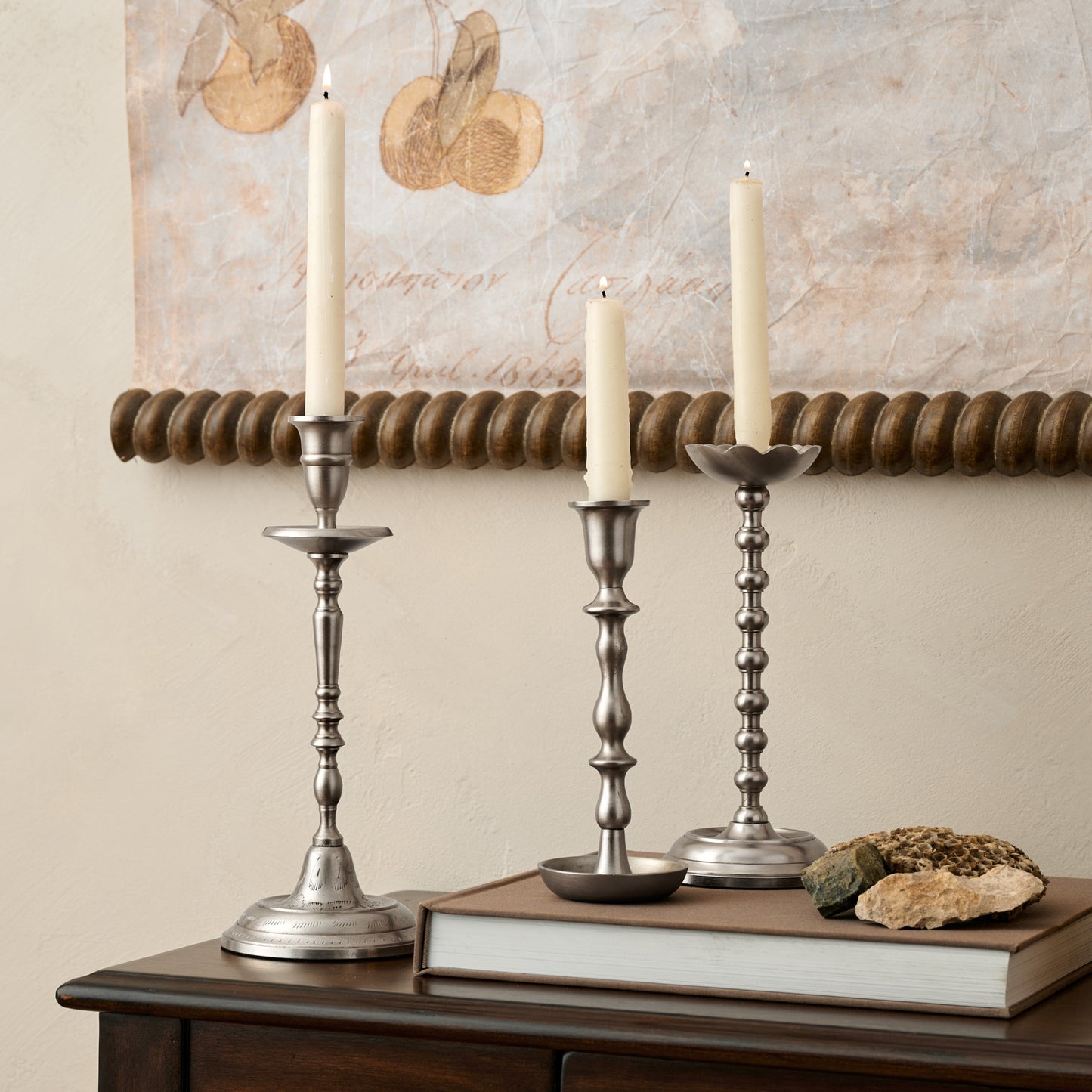 Cassandra Candle Holder on top of console table with decorative accessories