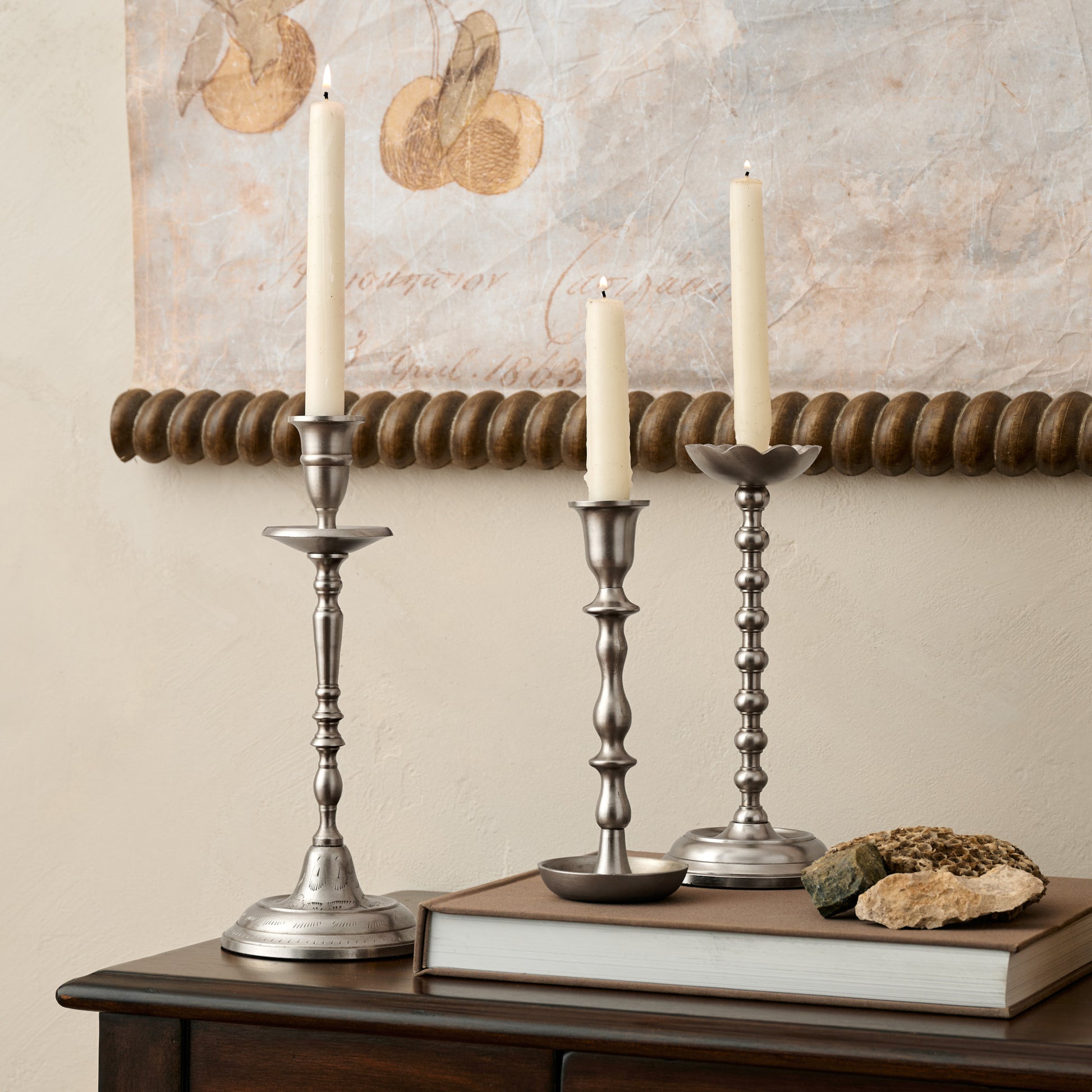 Cassandra Candle Holder on top of console table with decorative accessories