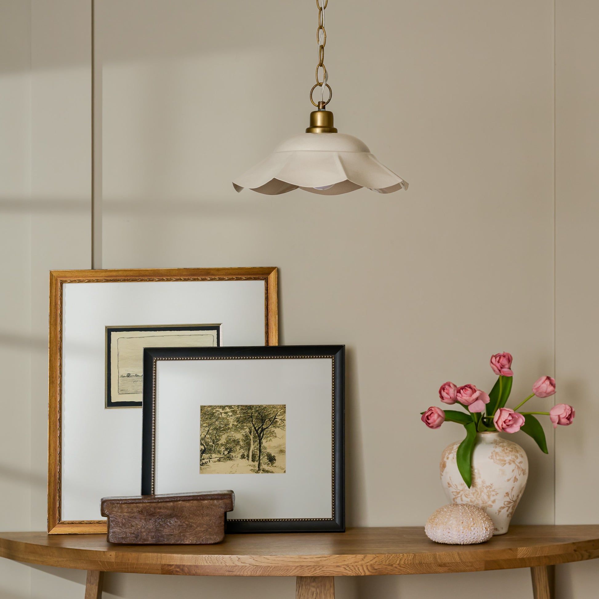 Mary Wired Pendant in a room over styled console table