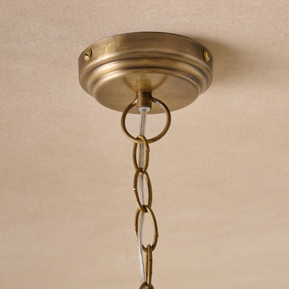 Mary Wired Pendant close up of brass base