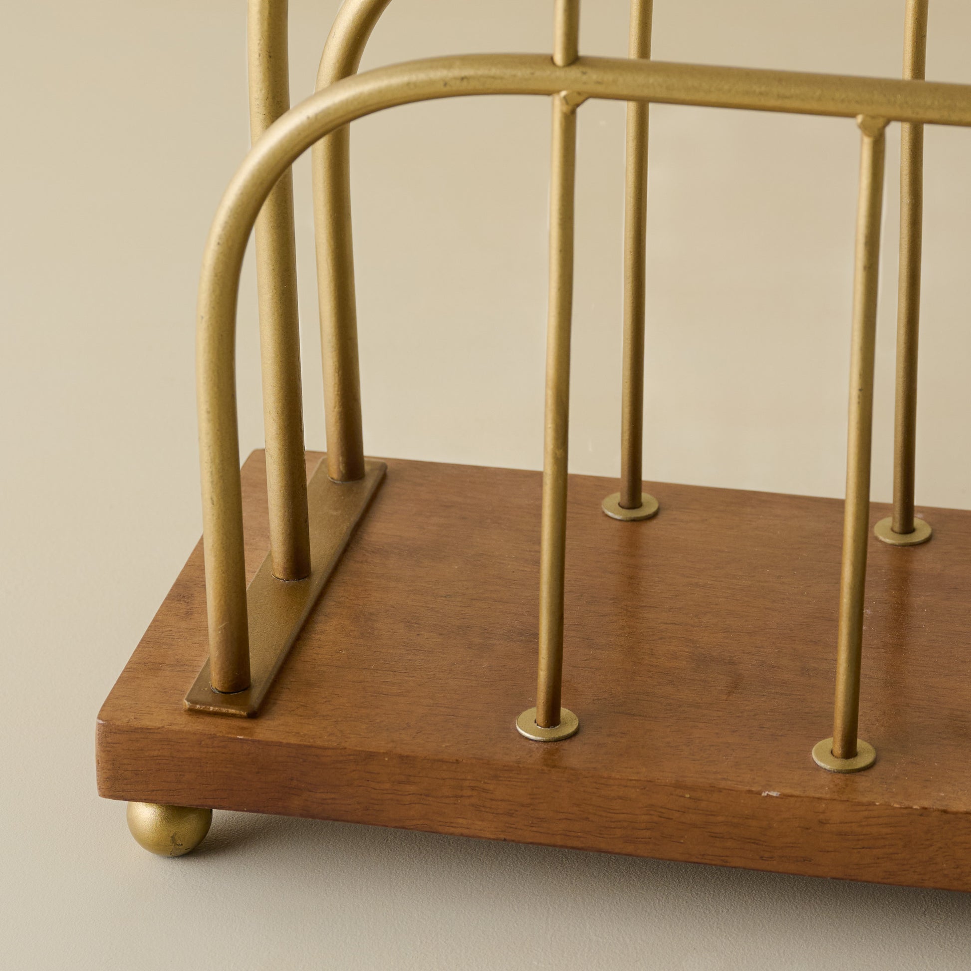 Short Antique Brass and Wood Media Stand close up view of brass material