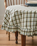 Olive Stone Round Tablecloth placed on table