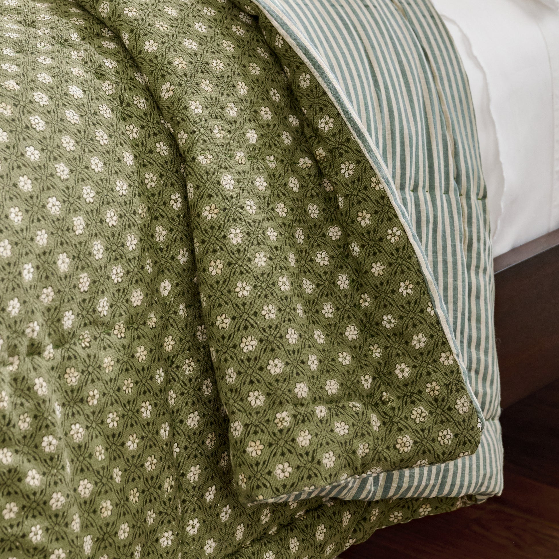 Thea Reversible Quilt close up of stripe reversible side