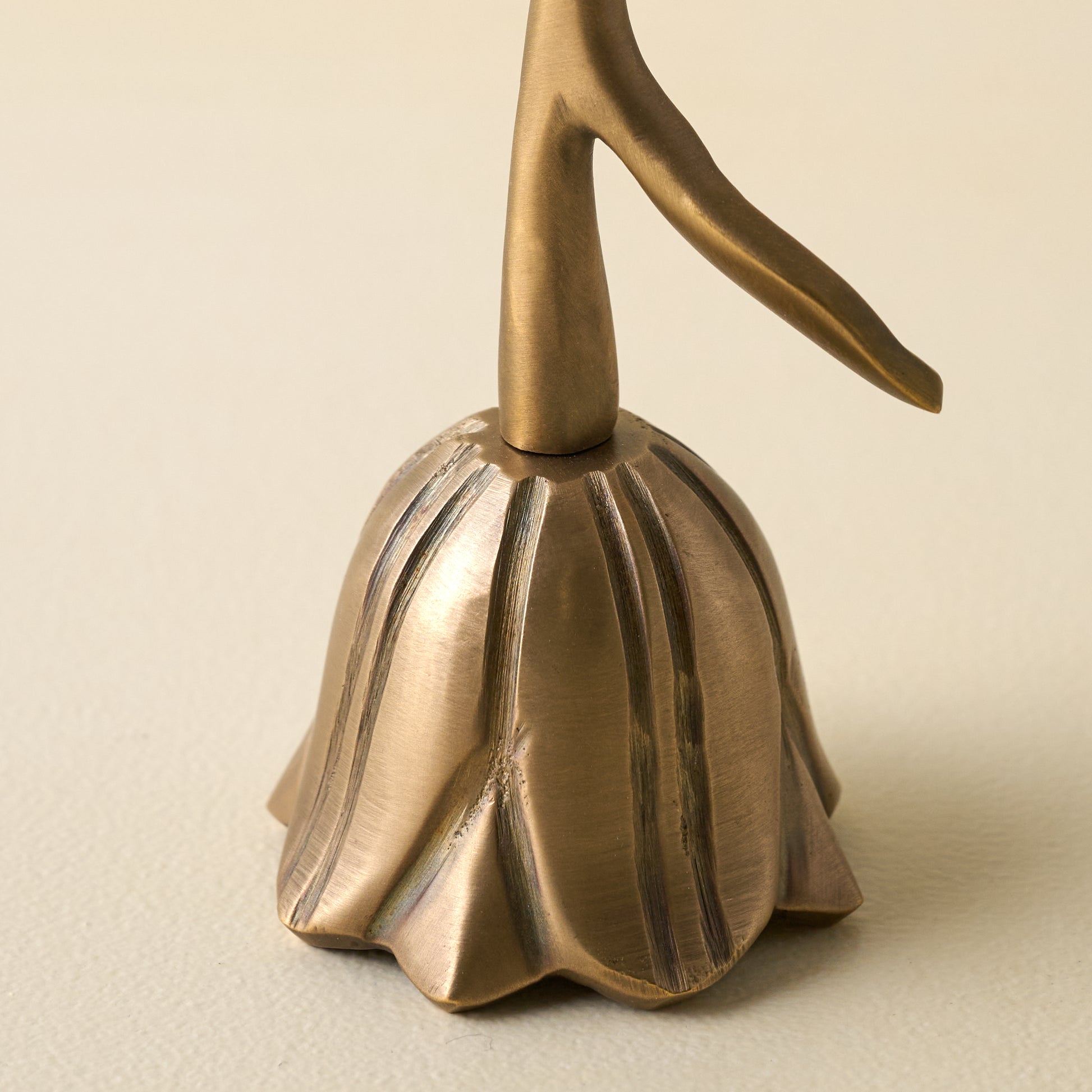 Floral Antique Brass Bell close up view