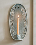 Annie Floral Ceramic Wall Sconce with taper candle lit 