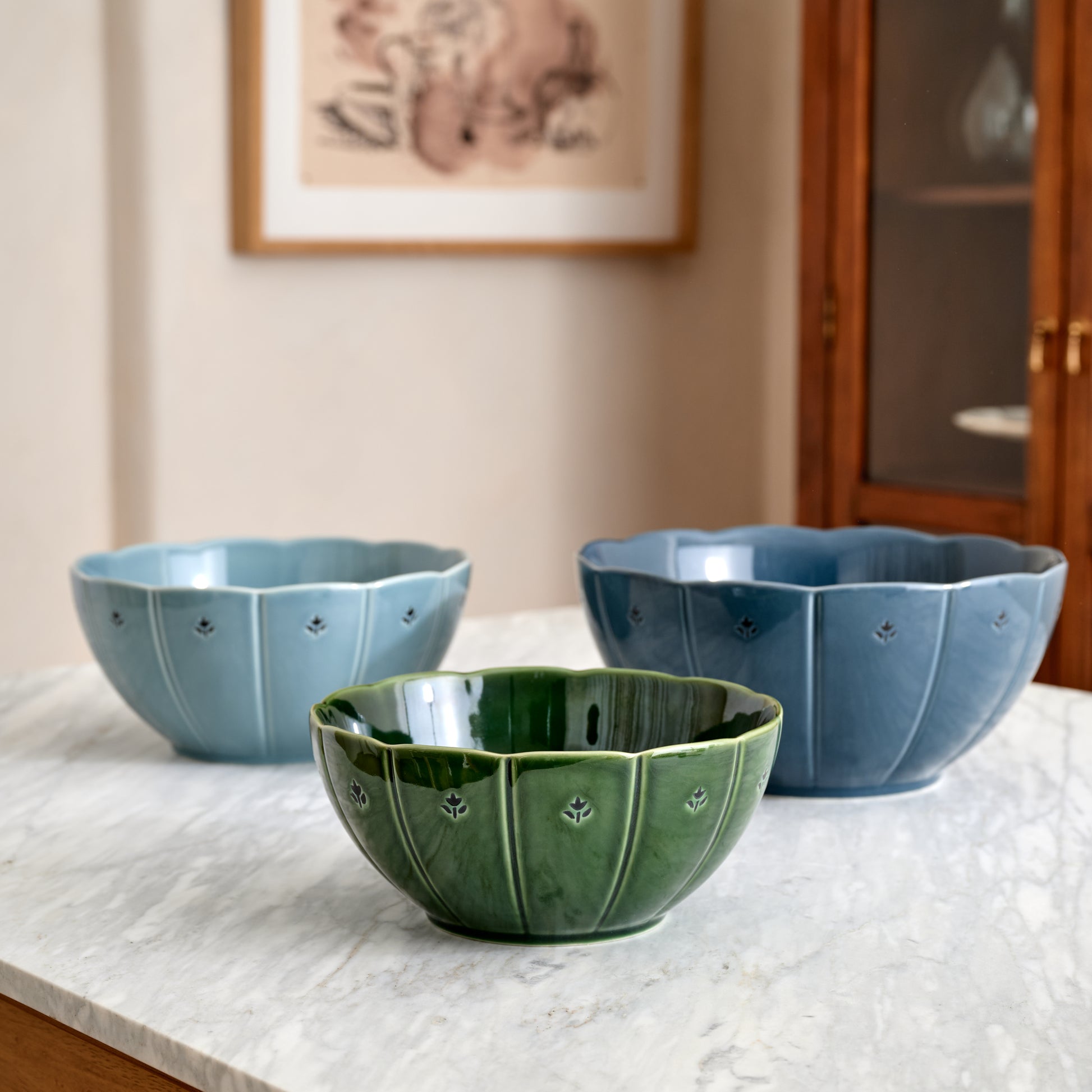 Luna Scalloped Mixing Bowl Set of Three on top of countertop