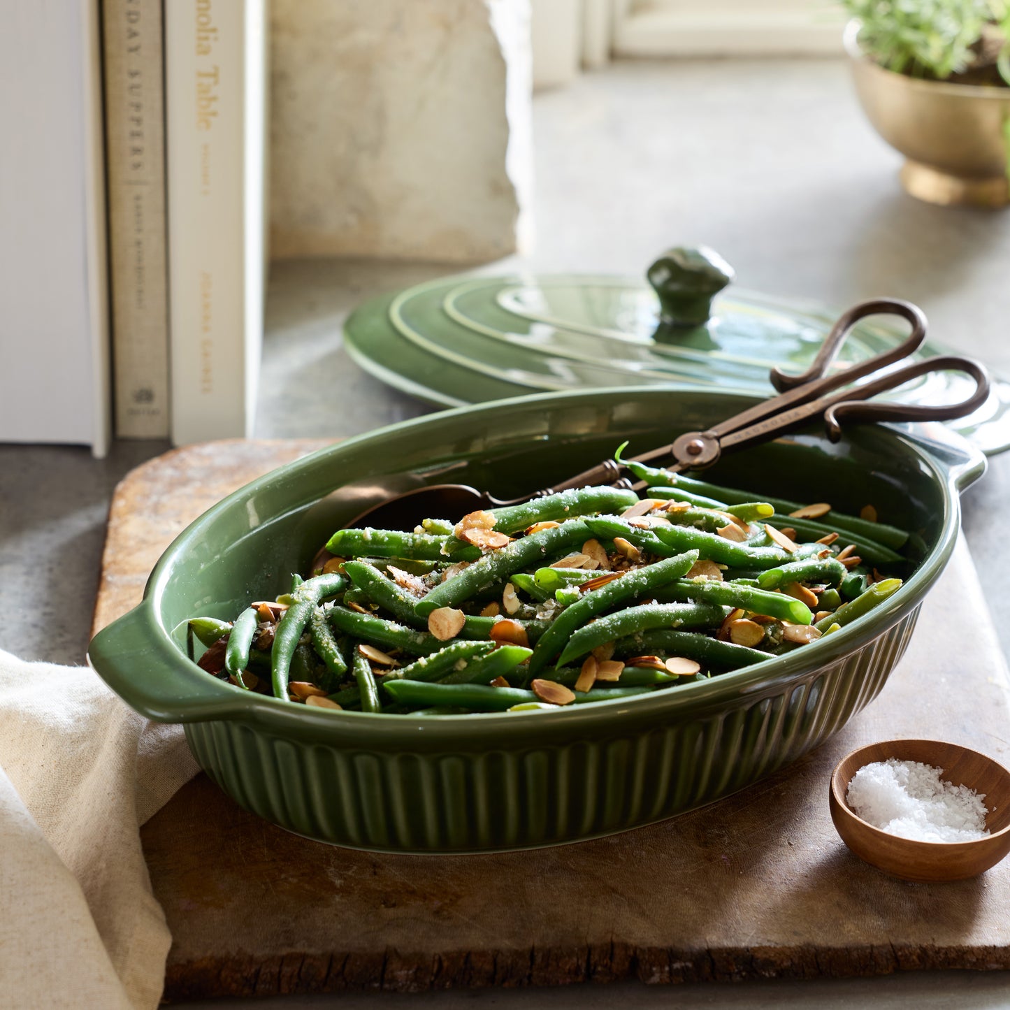Cottage Collection Forest Green Oval Baking Dish with savory green beans inside 