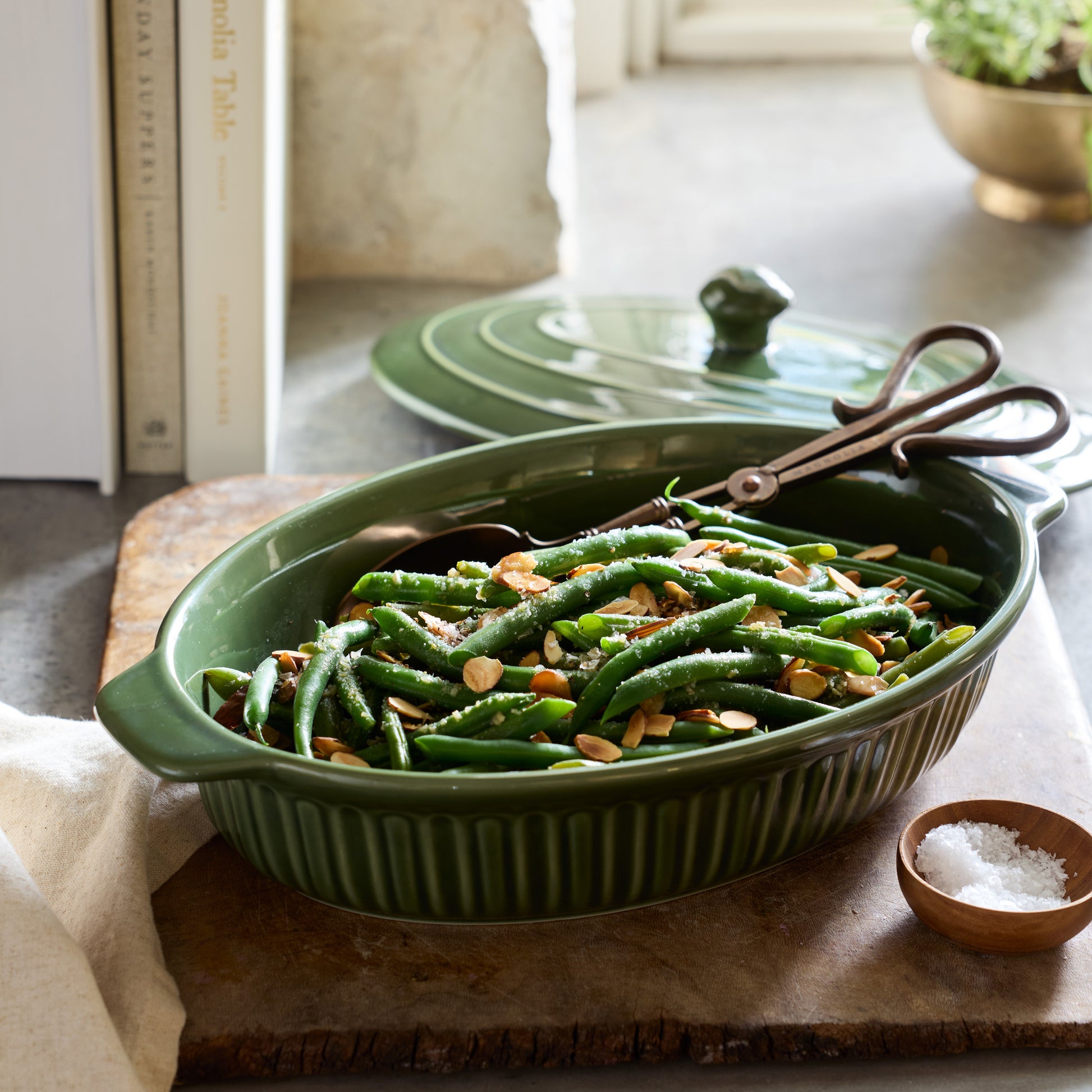 Cottage Collection Forest Green Oval Baking Dish with savory green beans inside 