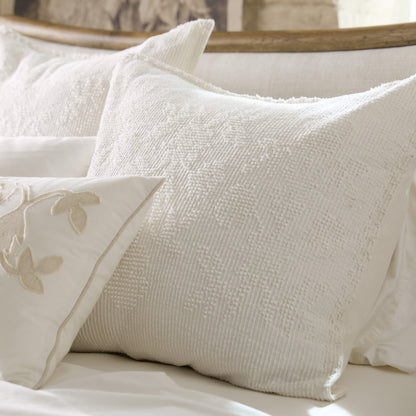 Vintage Chenille Sham close up view on bed with pillow insert