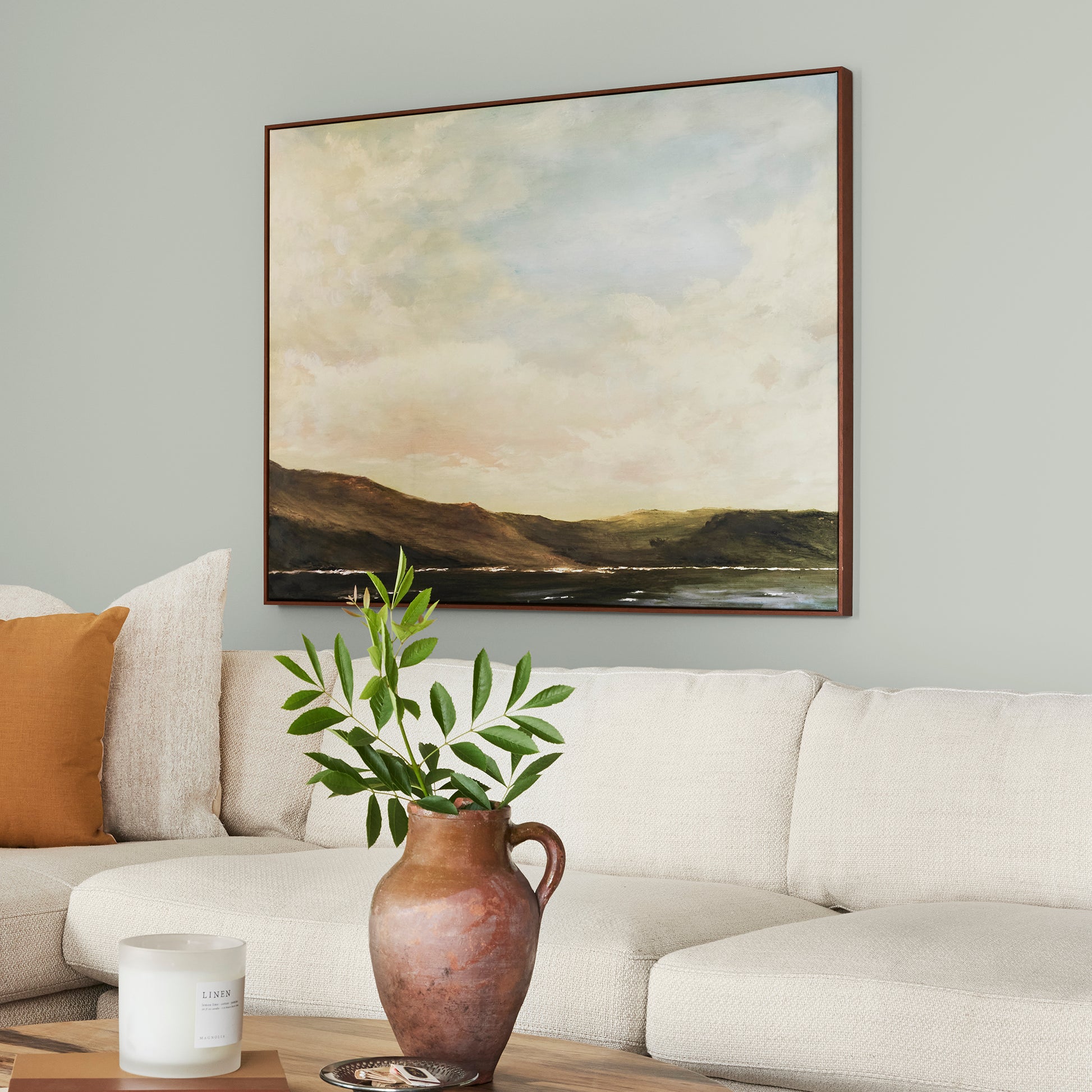 light blue grey with light green undertone interior paint named emmies room shown painted on living room wall