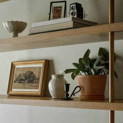Farmland Study with a vase and a potted plant on a shelf