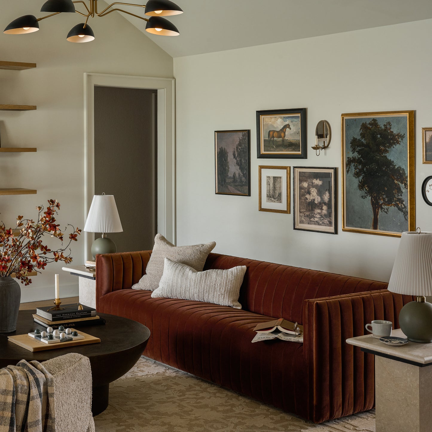 Equestrian Study on a gallery wall above a sofa